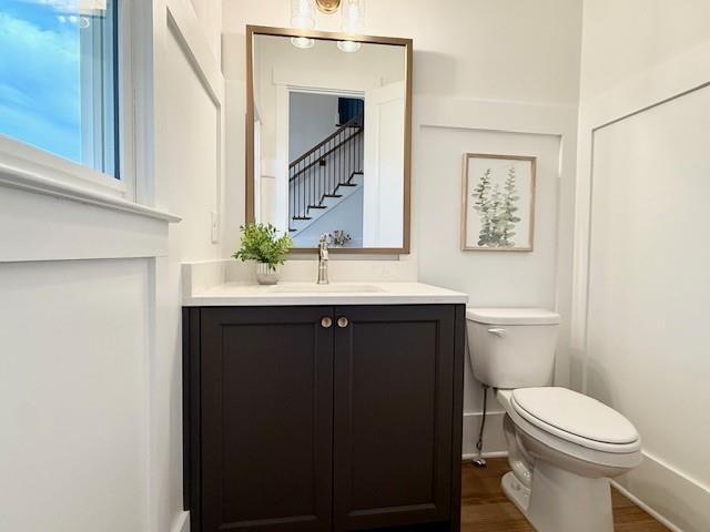 326 Reese Way Ball Ground, GA 30107 - Photo 5 of 37 a bathroom with a sink vanity mirror and toilet