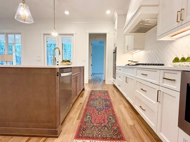 326 Reese Way Ball Ground, GA 30107 - Photo 10 of 37 a large white kitchen with stainless steel appliances granite countertop a stove a sink and a refrigerator