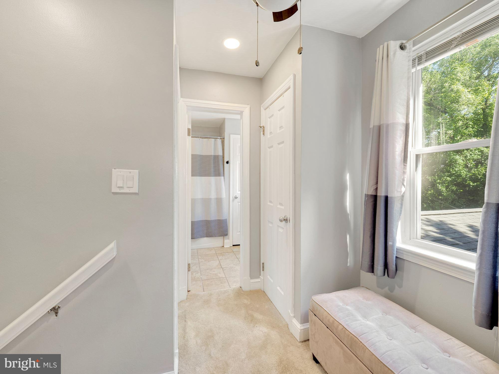 2703 Arcola Avenue Silver Spring, MD 20902 - Photo 17 of 29 Upper Level landing peeking into Bathroom.