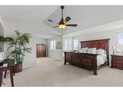 a bed room with furniture and a window