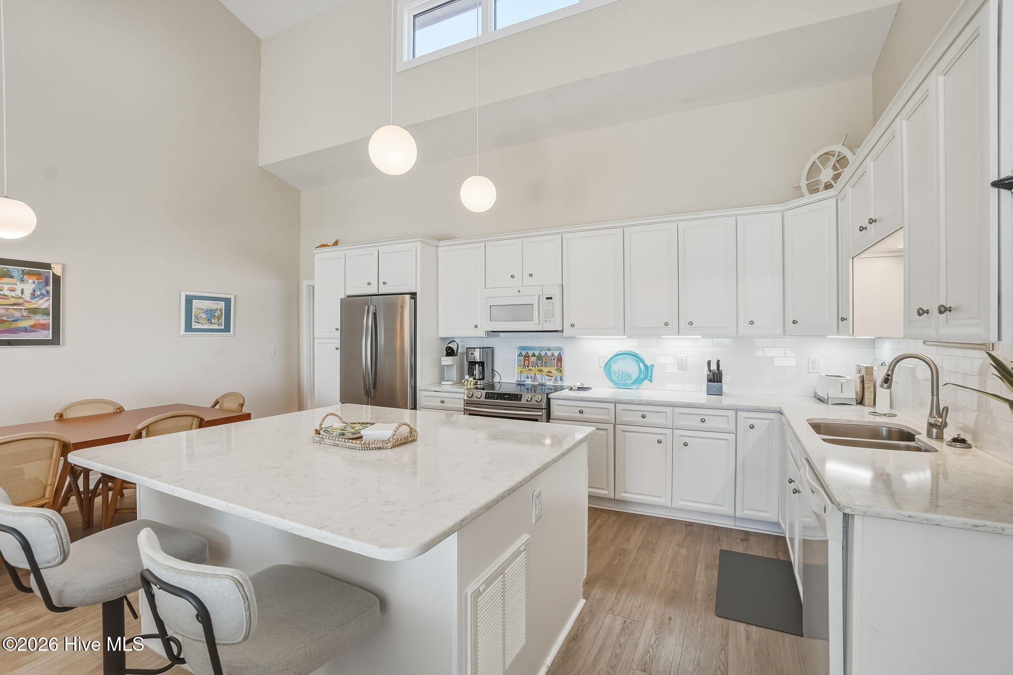 289 Salter Path Road, Unit 10 Pine Knoll Shores, NC 28512 - Photo 24 of 44 Kitchen with Eat In Bar