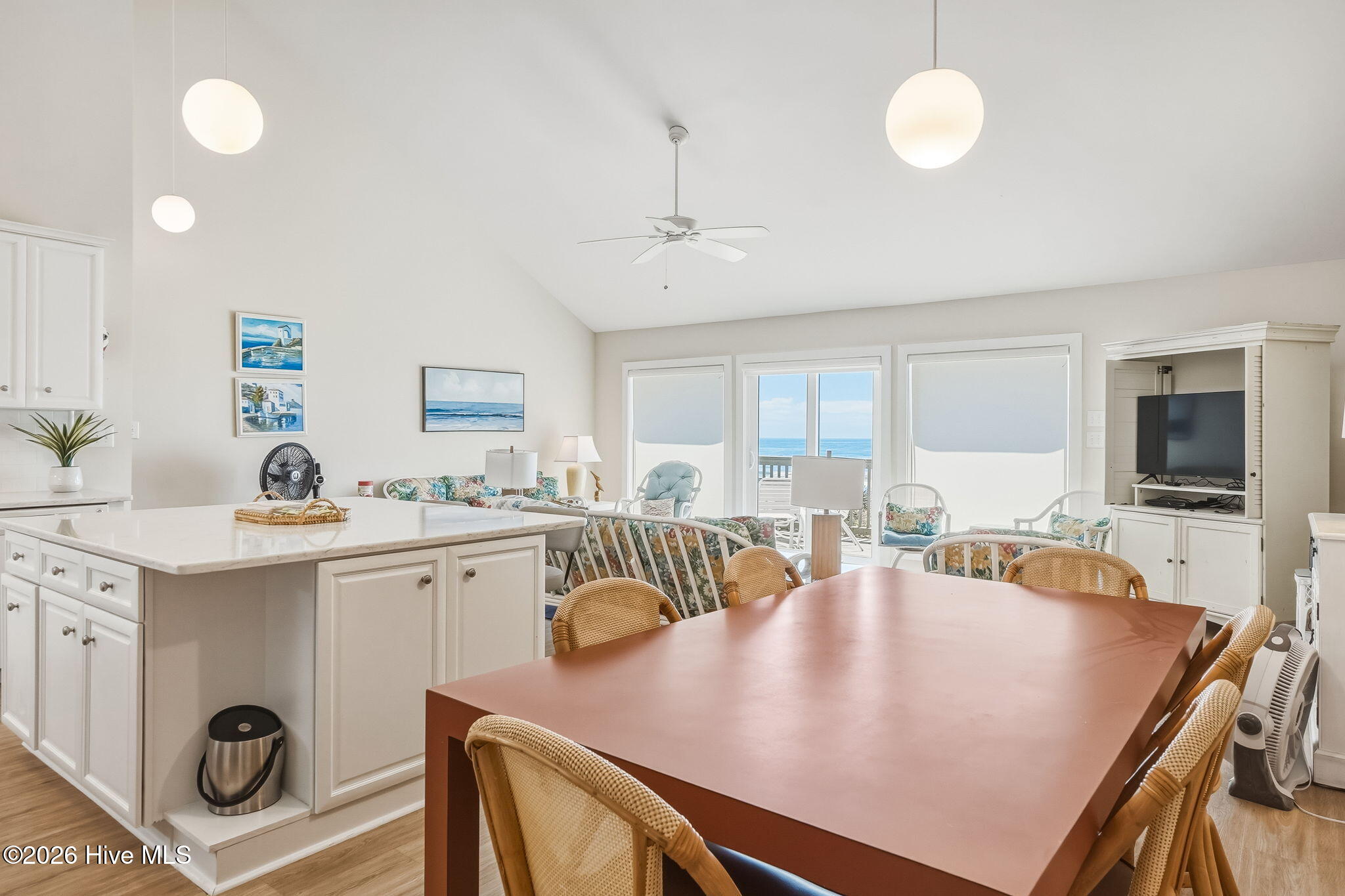 289 Salter Path Road, Unit 10 Pine Knoll Shores, NC 28512 - Photo 30 of 44 Ocean Front Dining, Kitchen and Living