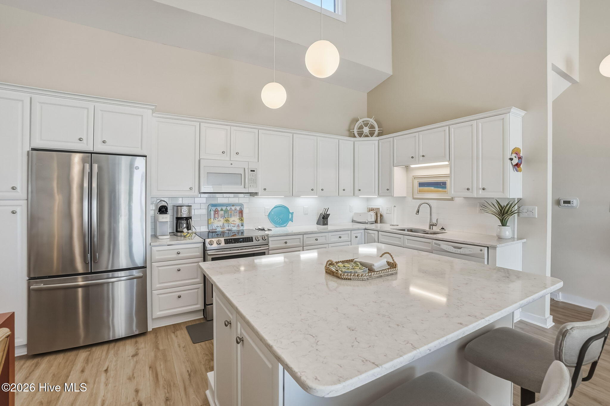 289 Salter Path Road, Unit 10 Pine Knoll Shores, NC 28512 - Photo 31 of 44 Kitchen with Bar Countertop
