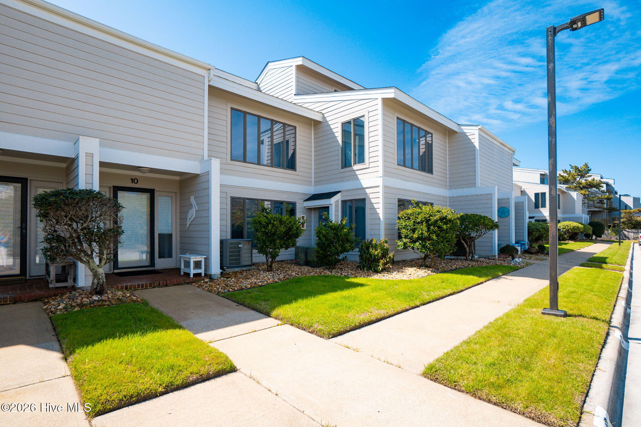 289 Salter Path Road, Unit 10 Pine Knoll Shores, NC 28512 - Photo 4 of 44 Front Entry