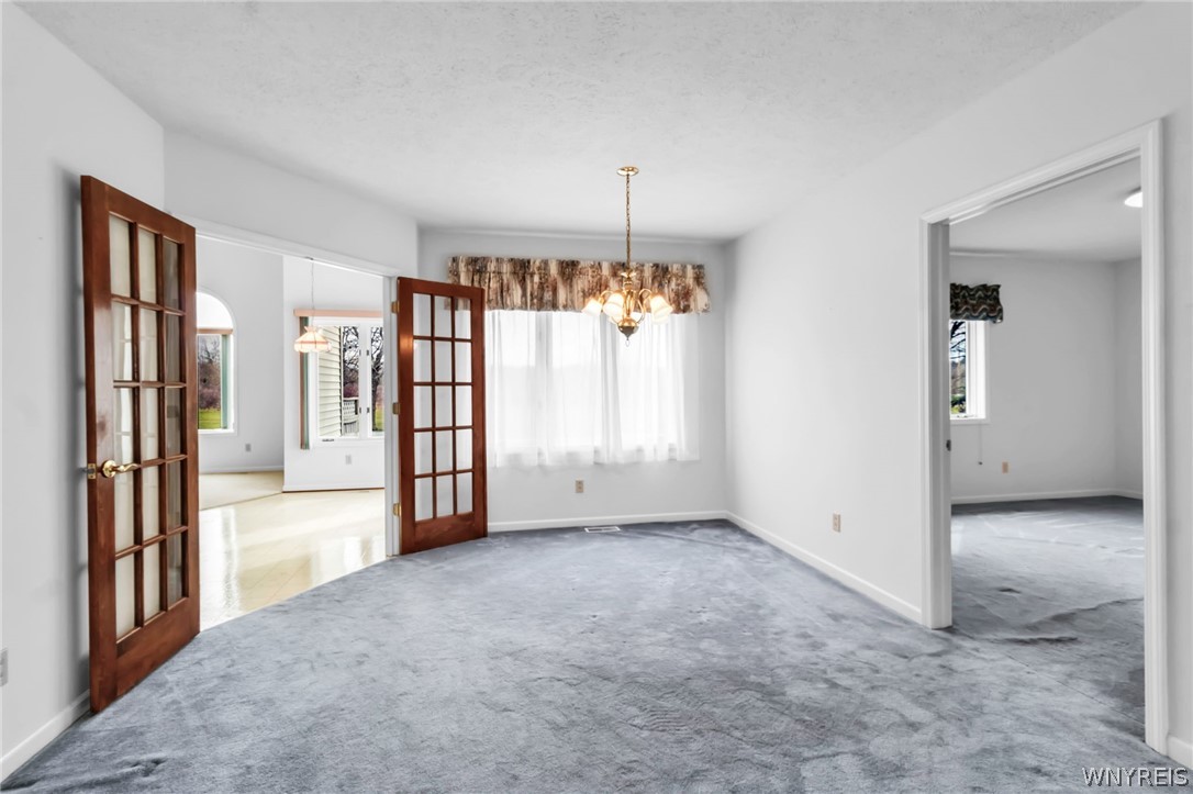 5005 Harris Hill Road Buffalo, NY 14221 - Photo 11 of 38 dining are entrance to kitchen