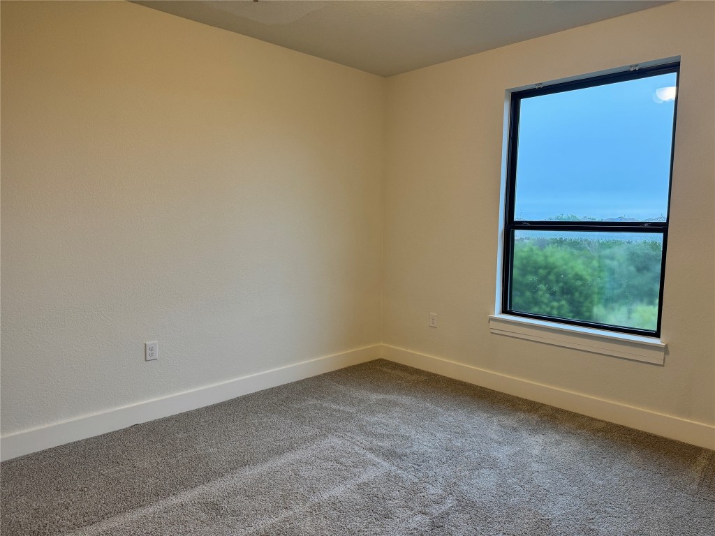 11415 Culzean Castle Drive Austin, TX 78717 - Photo 19 of 21 an empty room with a window
