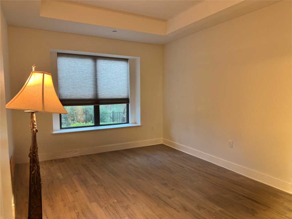 11415 Culzean Castle Drive Austin, TX 78717 - Photo 9 of 21 an empty room with wooden floor and window