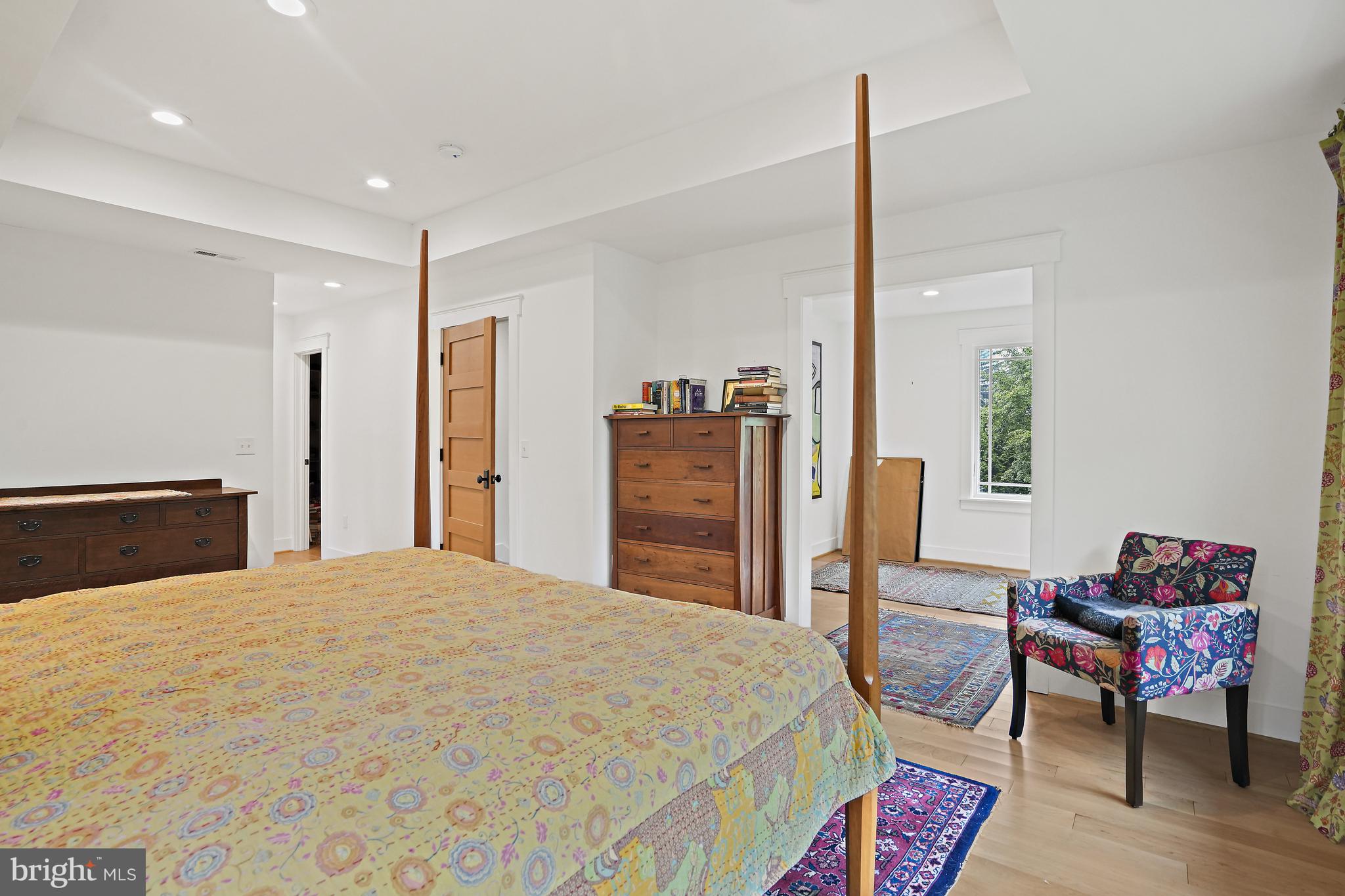 4621 Drummond Avenue Chevy Chase, MD 20815 - Photo 15 of 33 a bedroom with a bed and furniture