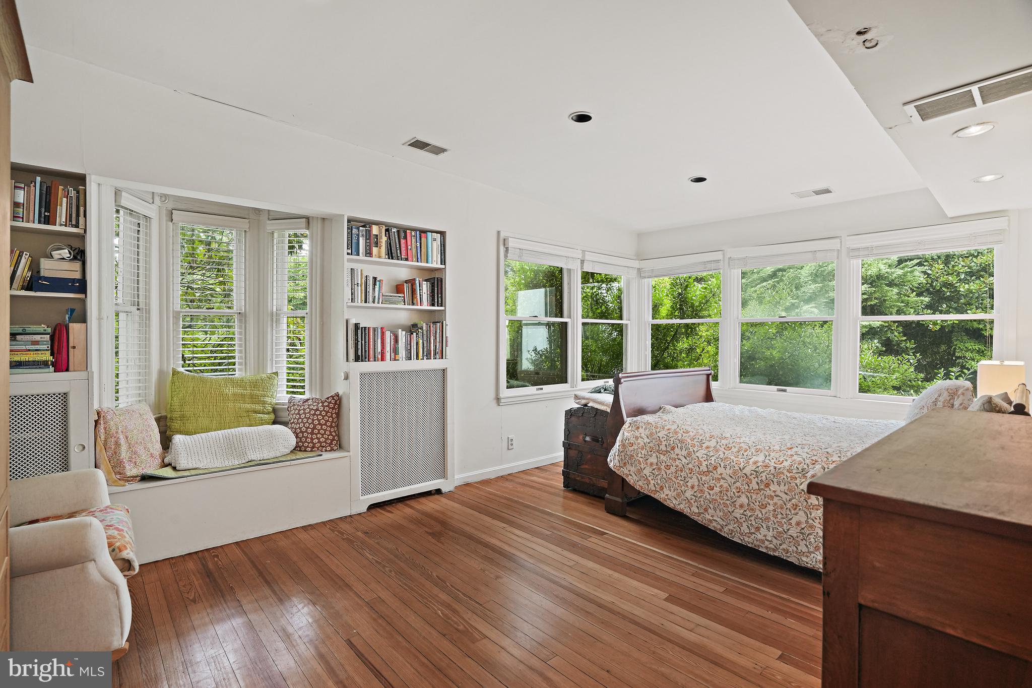 4621 Drummond Avenue Chevy Chase, MD 20815 - Photo 19 of 33 a living room with furniture and a large window