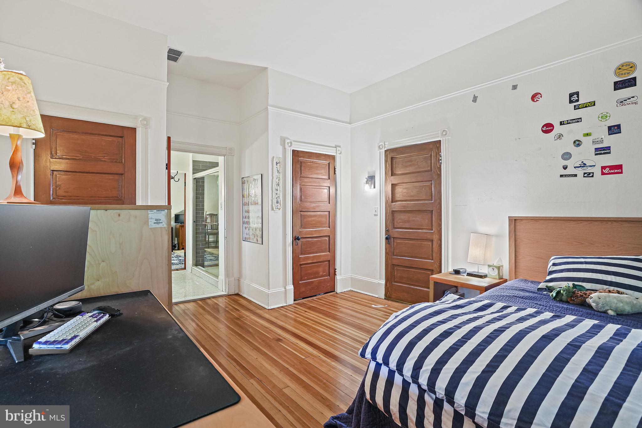 4621 Drummond Avenue Chevy Chase, MD 20815 - Photo 23 of 33 a bedroom with a bed and a window