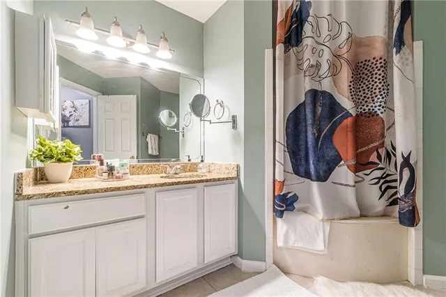 a outdoor living space with furniture and a potted plant