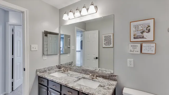 a view of kitchen and windows