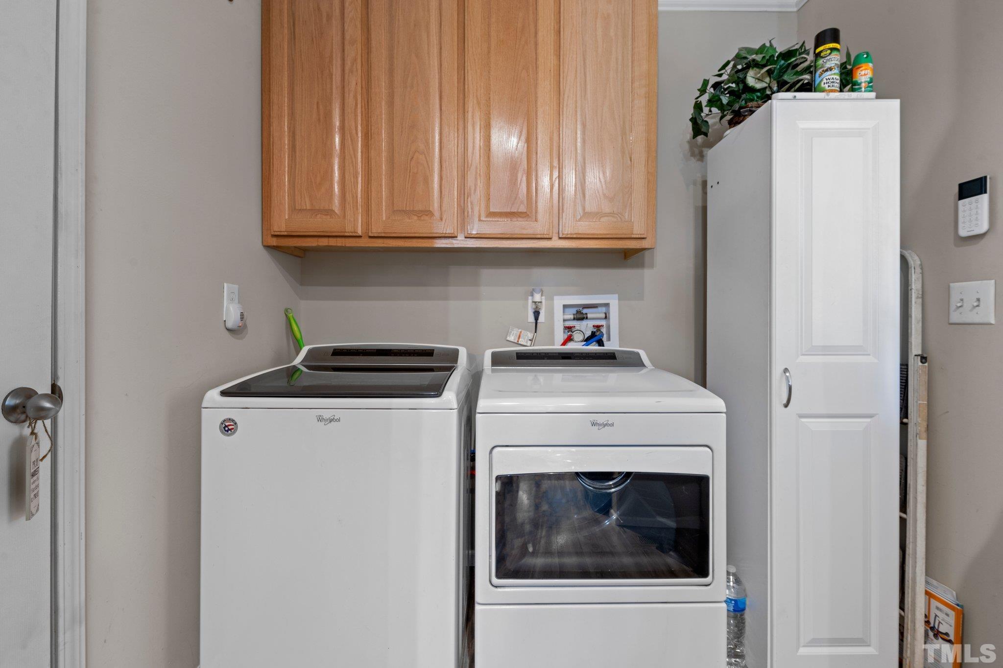1467 Nelson Loop Roxboro, NC 27574 - Photo 17 of 32 a utility room with dryer and washer