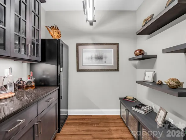 a kitchen with stainless steel appliances granite countertop a stove and a sink