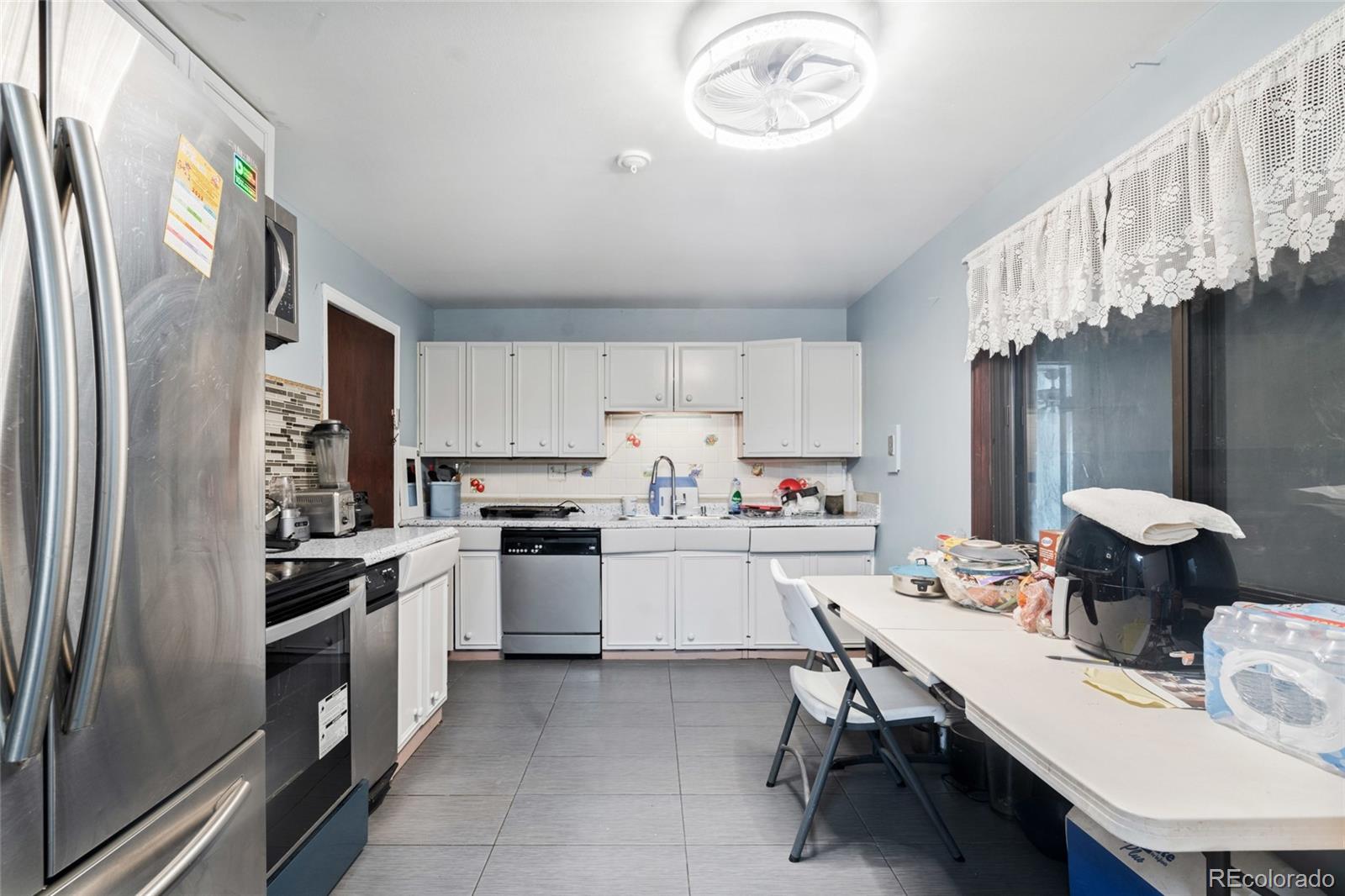 3148 Racine Street Aurora, CO 80011 - Photo 4 of 32