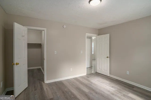 a view of an empty walk in closet
