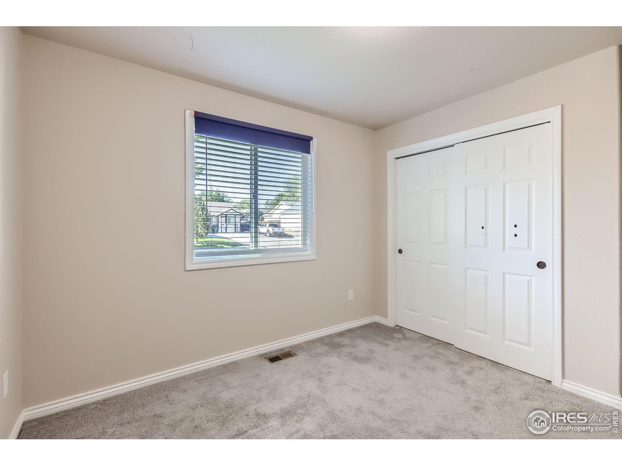 135 Falcon Circle Mead, CO 80542 - Photo 20 of 27 an empty room with windows