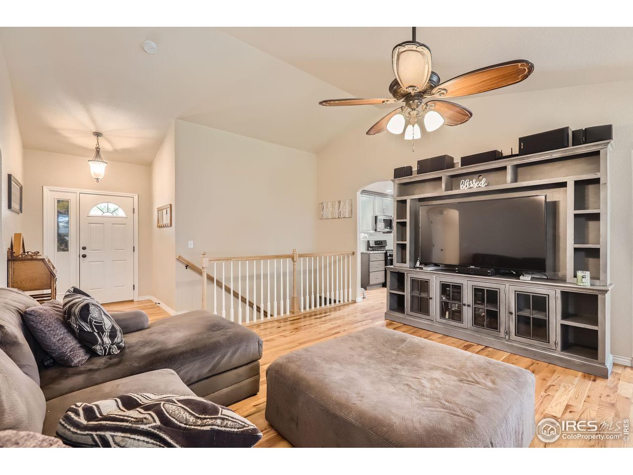 135 Falcon Circle Mead, CO 80542 - Photo 7 of 27 a living room with furniture and a flat screen tv