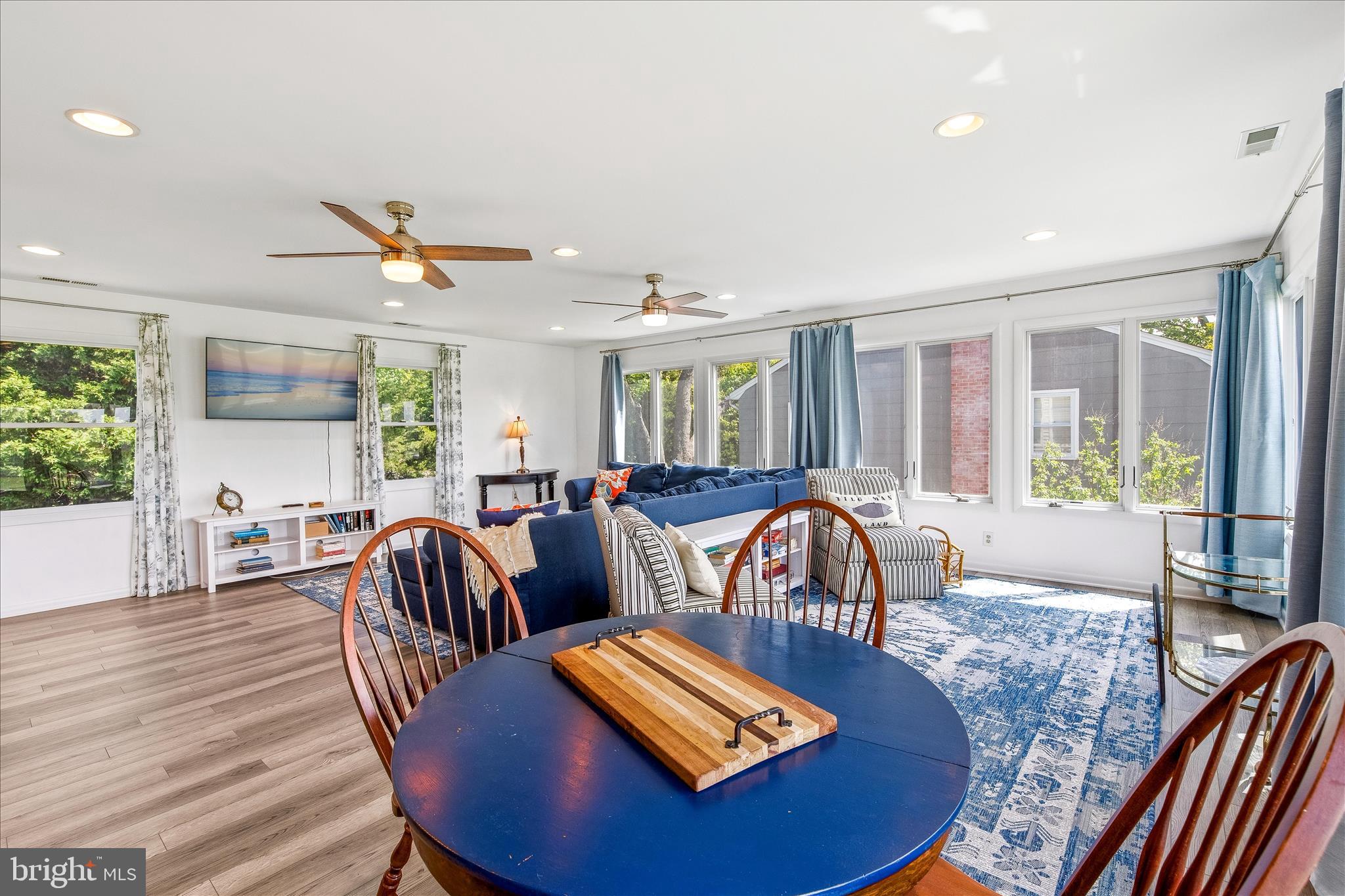 21406 Dogwood Cove Road Tilghman, MD 21671 - Photo 49 of 68 a living room with furniture and wooden floor