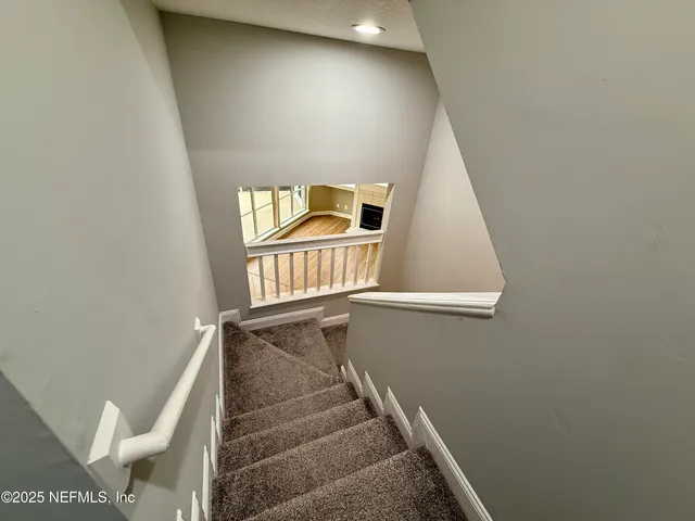 a view of a room with racks on the wall