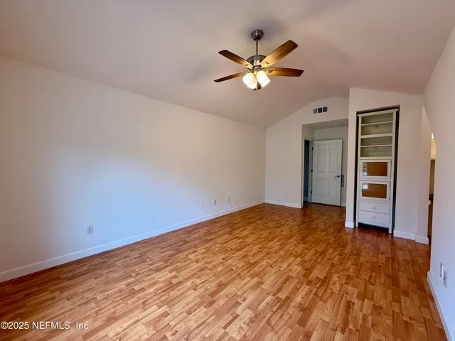 front view of a house with a swimming pool