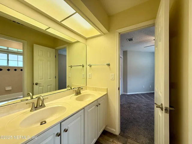 a view of a lake with a yard