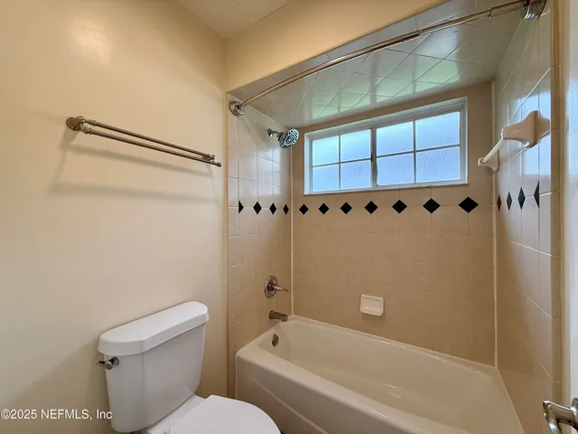 a view of a lake with a yard