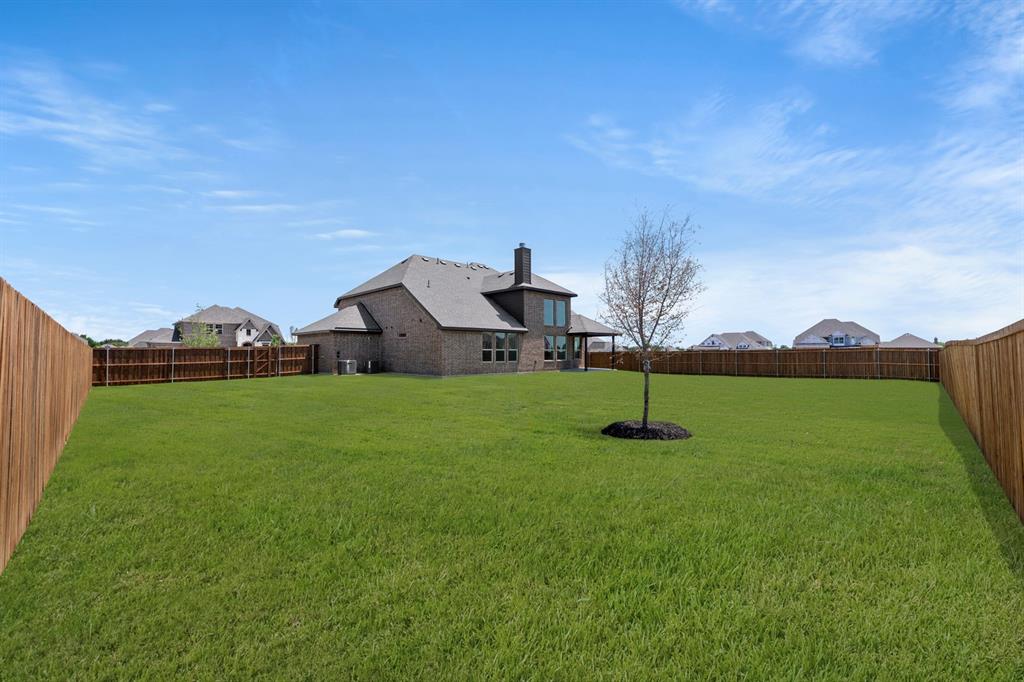 505 Alto Avenue Forney, TX 75126 - Photo 32 of 32 a front view of a house with a yard