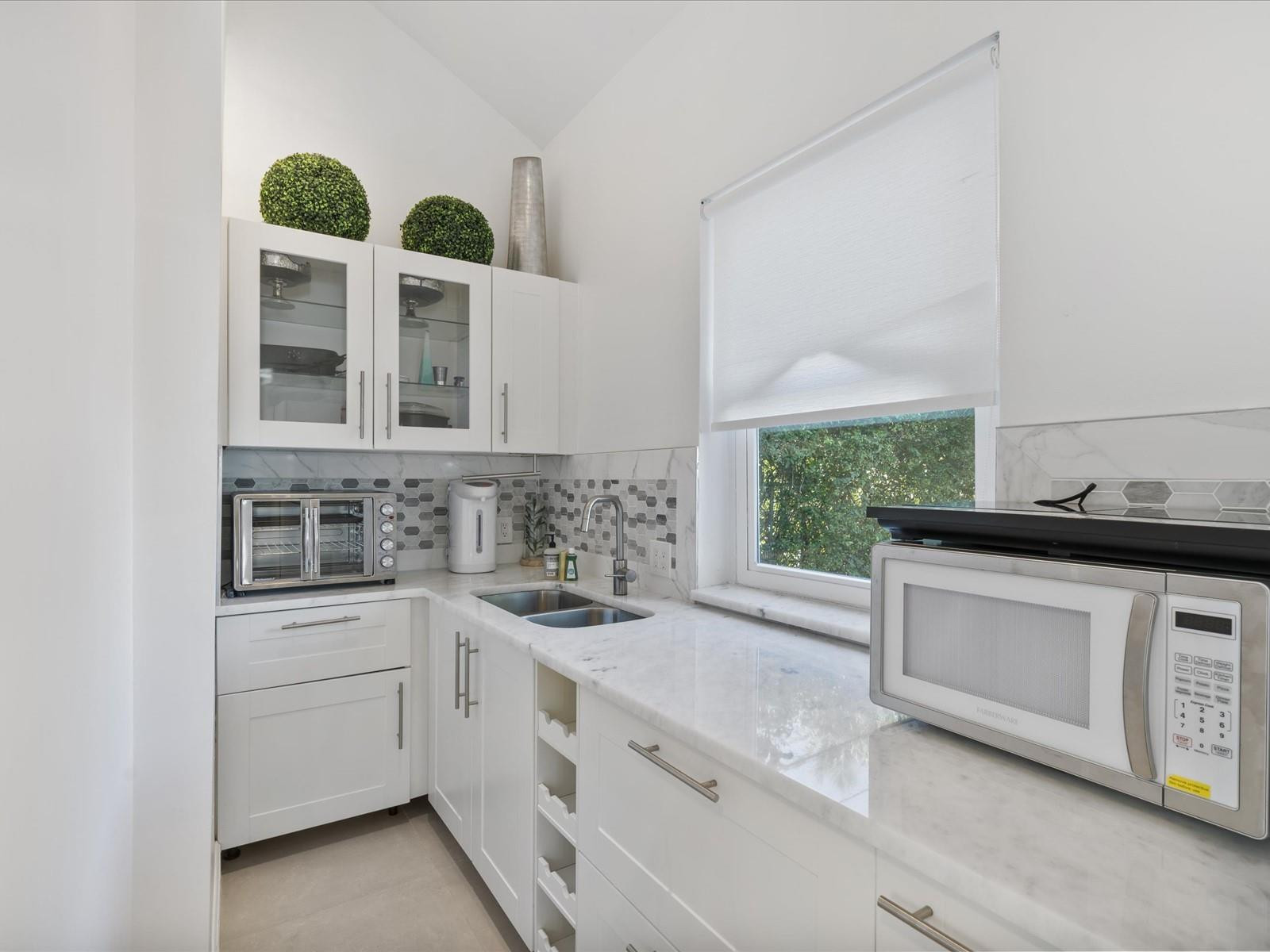 9232 Harding Avenue Surfside, FL 33154 - Photo 20 of 24 Back house Kitchen