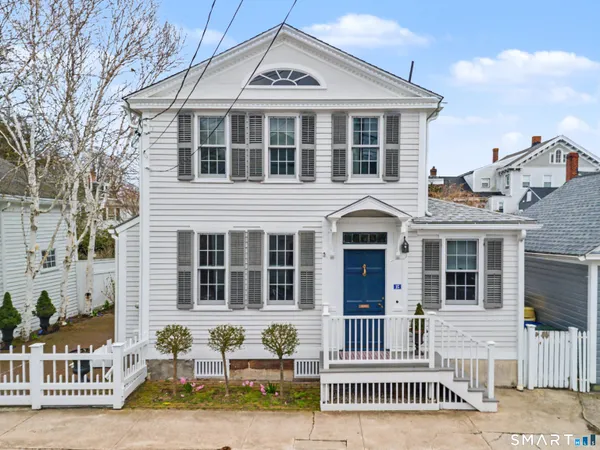 a front view of a house with a porch