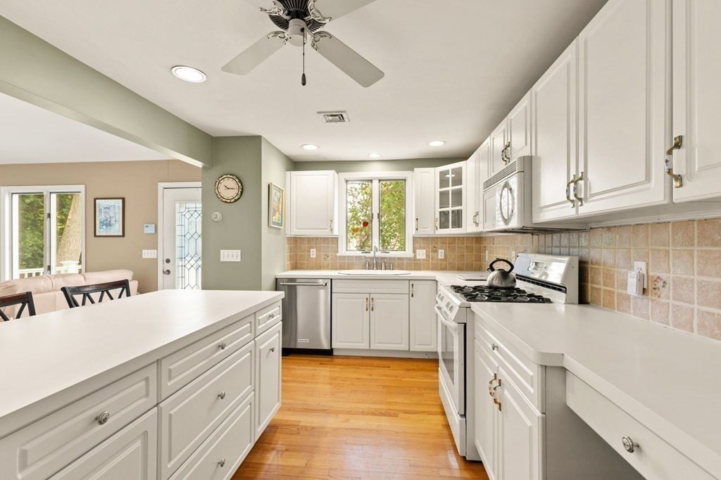 29 Marshall Road Easton, MA 02356 - Photo 14 of 31 a kitchen with a sink stove and cabinets