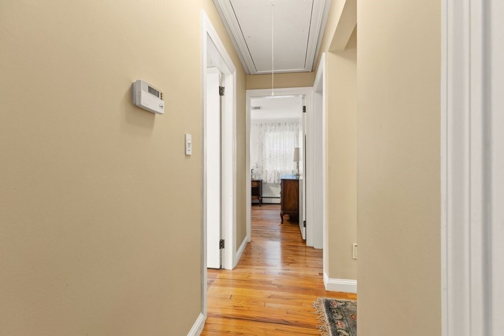 29 Marshall Road Easton, MA 02356 - Photo 18 of 31 a view of a hallway with wooden floor and closet