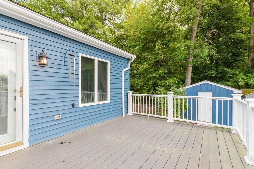 29 Marshall Road Easton, MA 02356 - Photo 22 of 31 a view of backyard with deck and wooden floor