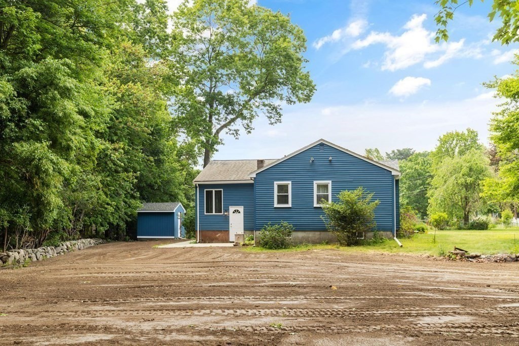 29 Marshall Road Easton, MA 02356 - Photo 28 of 31 a front view of a house with a garden