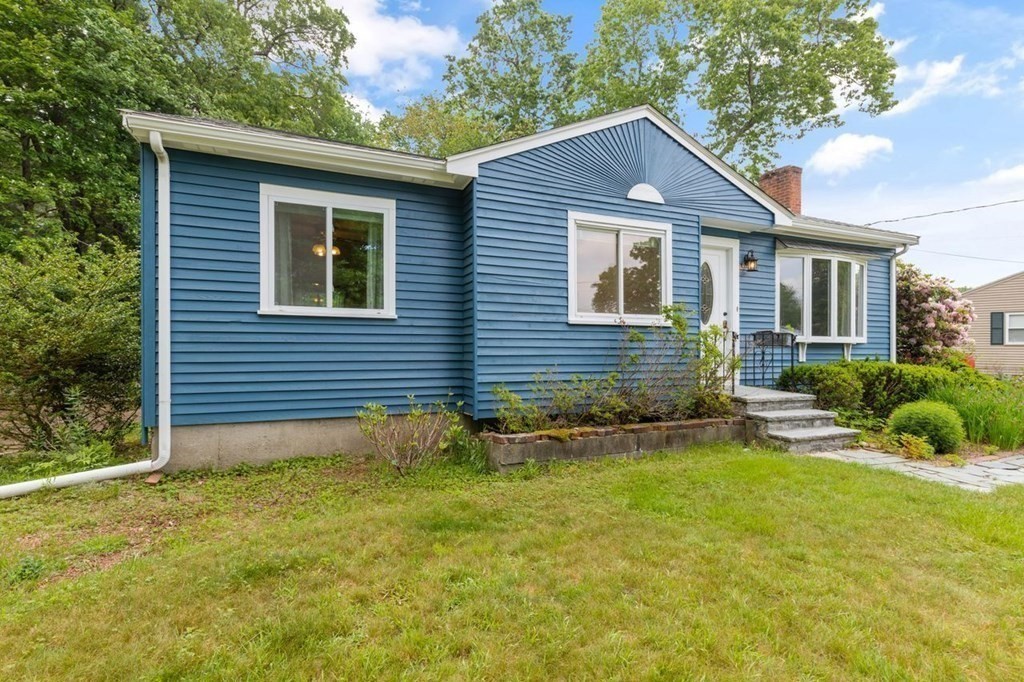 29 Marshall Road Easton, MA 02356 - Photo 30 of 31 a front view of a house with a yard and garage