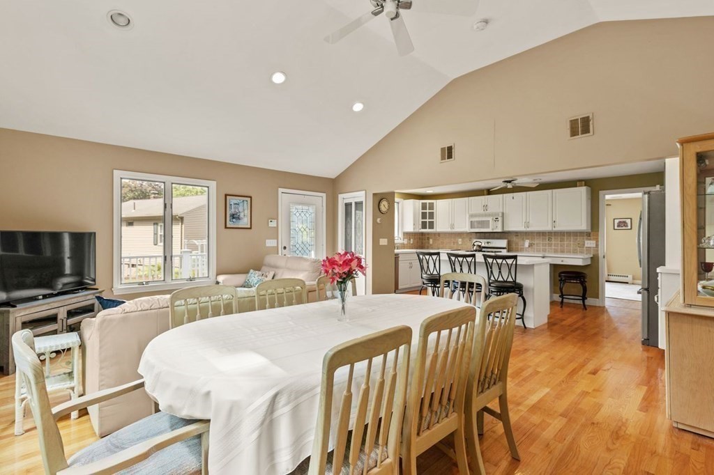 29 Marshall Road Easton, MA 02356 - Photo 7 of 31 a view of a dining room with furniture and wooden floor