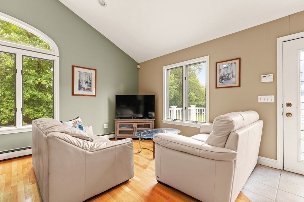29 Marshall Road Easton, MA 02356 - Photo 10 of 31 a living room with furniture and a flat screen tv
