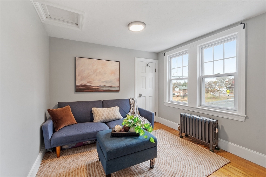 33 Herrick Road North Andover, MA 01845 - Photo 15 of 38 a living room with furniture and a window