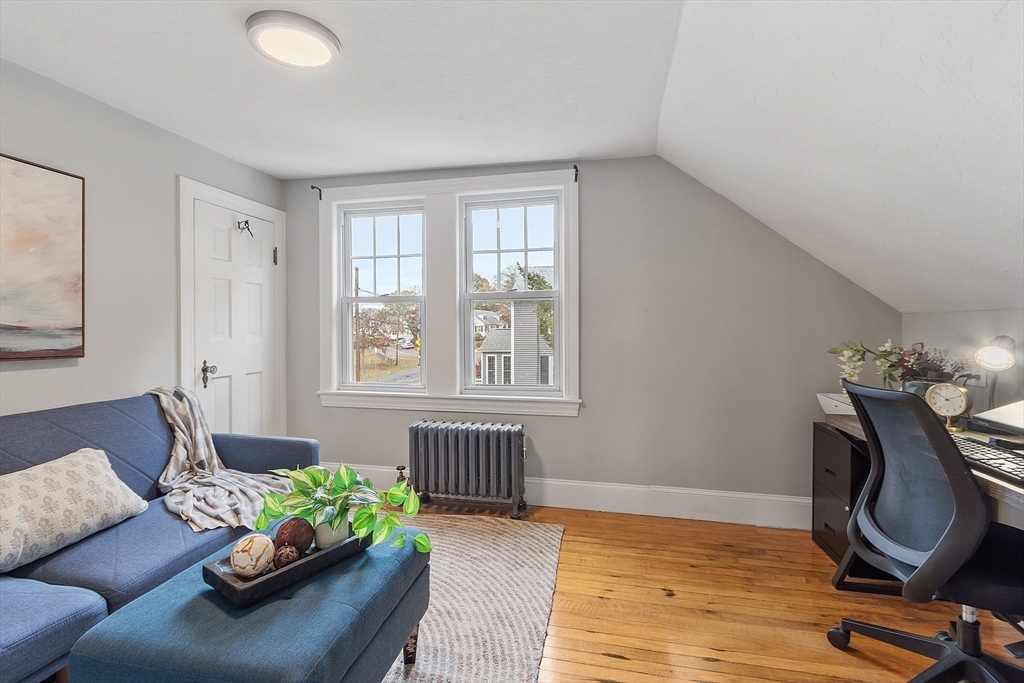 33 Herrick Road North Andover, MA 01845 - Photo 16 of 38 a living room with furniture and wooden floor