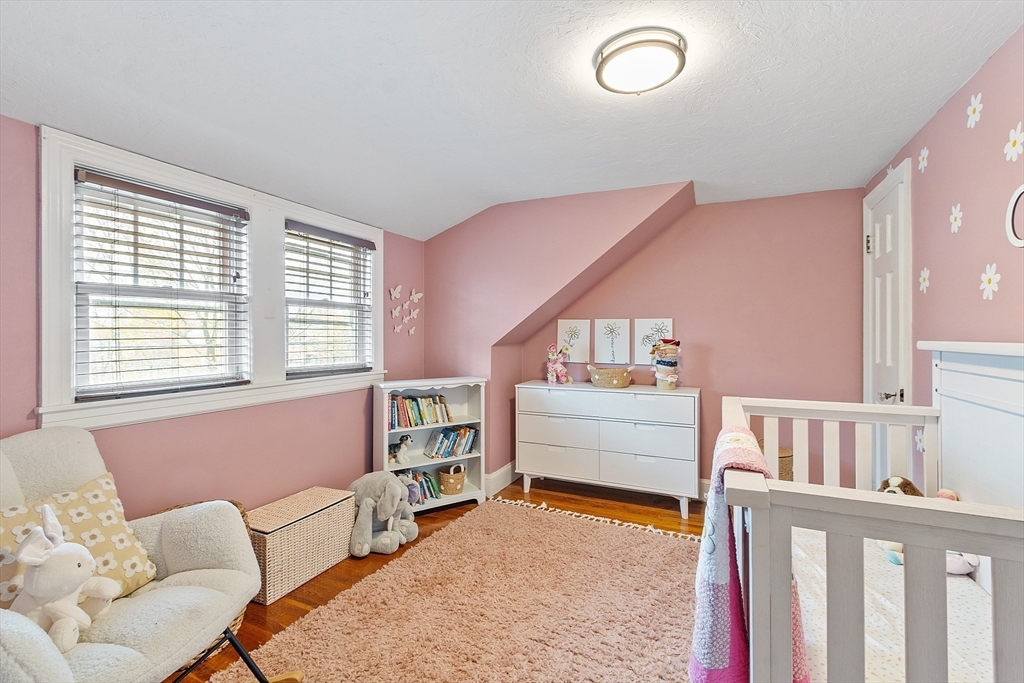 33 Herrick Road North Andover, MA 01845 - Photo 20 of 38 a bedroom with furniture and a window