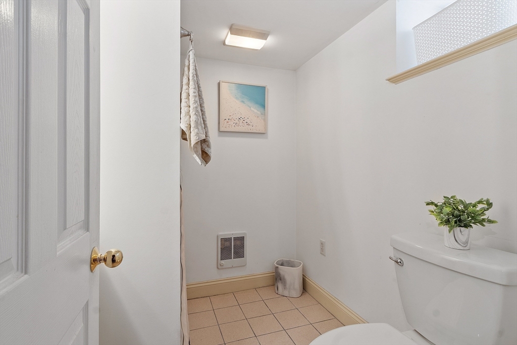 33 Herrick Road North Andover, MA 01845 - Photo 26 of 38 a bathroom with a toilet and a shower