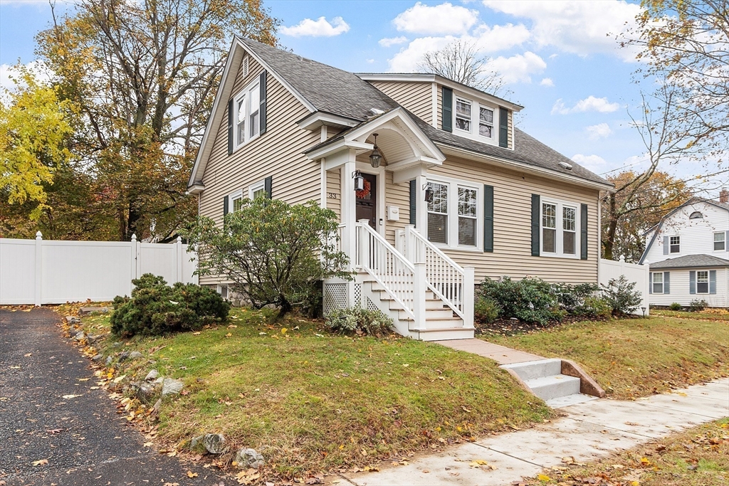 33 Herrick Road North Andover, MA 01845 - Photo 28 of 38 a front view of a house with a yard