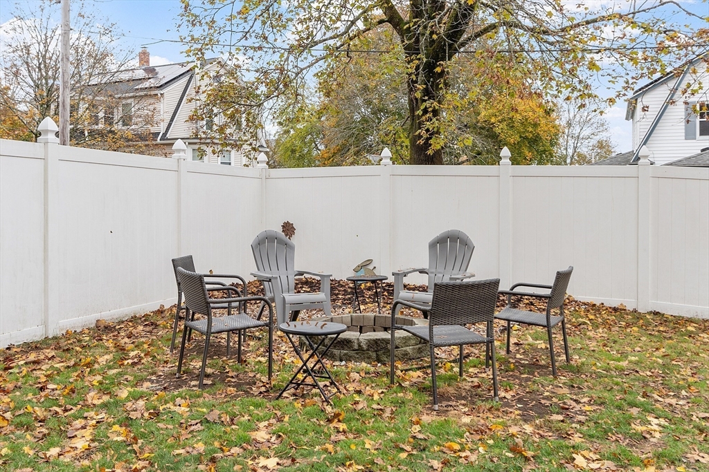 33 Herrick Road North Andover, MA 01845 - Photo 32 of 38 a view of a chairs and table in the patio