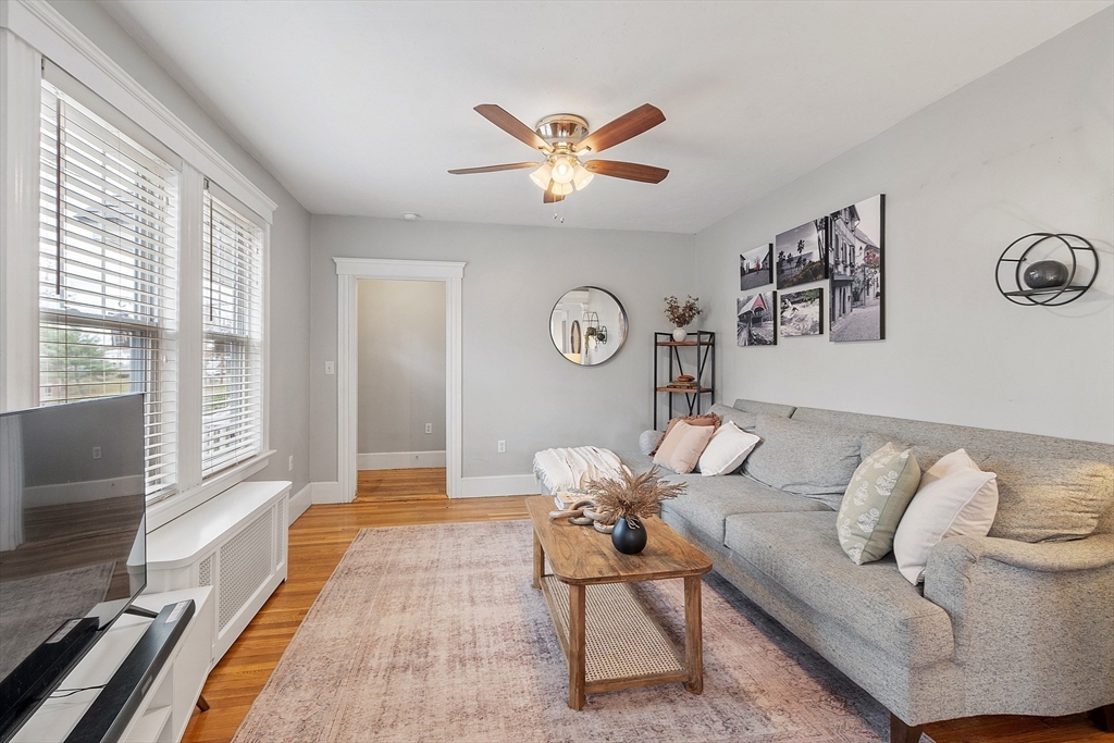 33 Herrick Road North Andover, MA 01845 - Photo 4 of 38 a living room with furniture and a large window