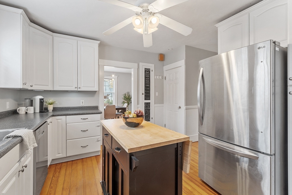 33 Herrick Road North Andover, MA 01845 - Photo 10 of 38 a kitchen with stainless steel appliances a refrigerator sink and cabinets
