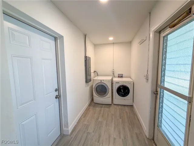 an aerial view of a house with outdoor space