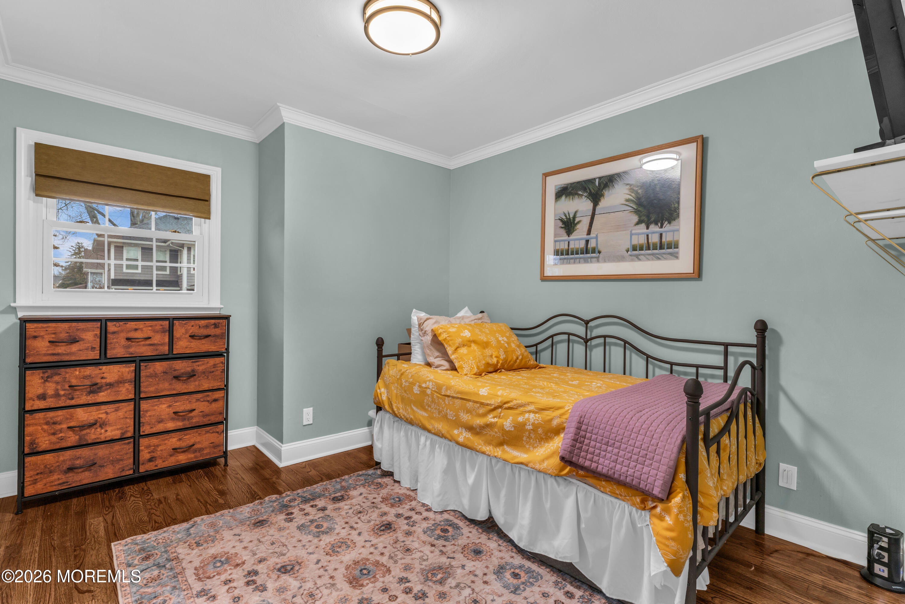75 Carpenter Street Red Bank, NJ 07701 - Photo 13 of 28 a bedroom with a bed and wooden floor