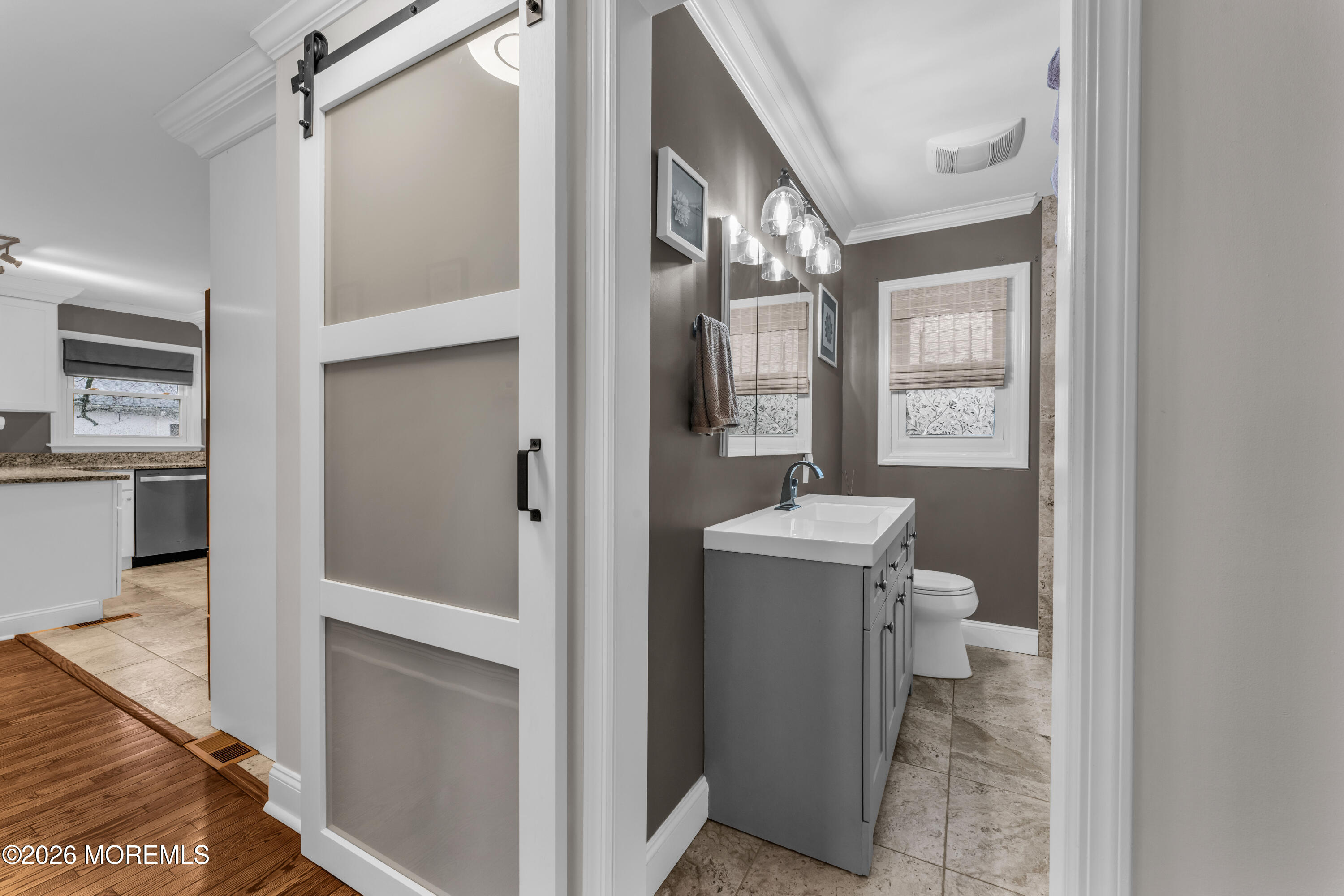 75 Carpenter Street Red Bank, NJ 07701 - Photo 15 of 28 a bathroom with a sink toilet and shower