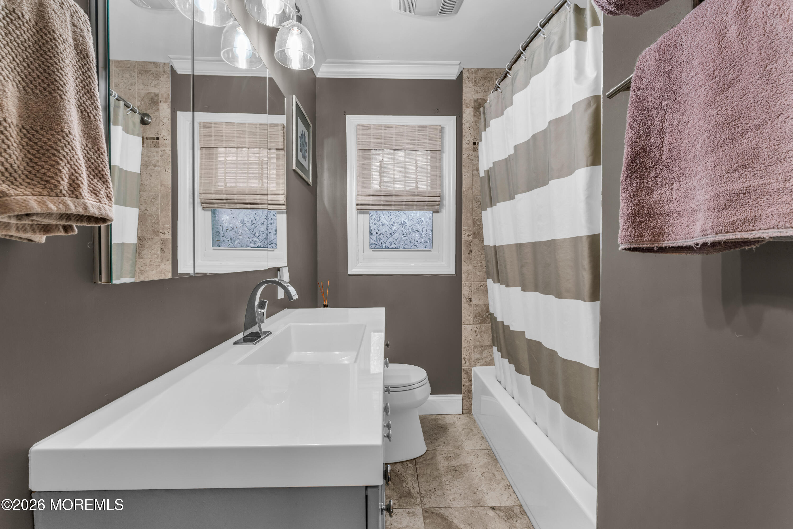 75 Carpenter Street Red Bank, NJ 07701 - Photo 17 of 28 a bathroom with a sink toilet and shower