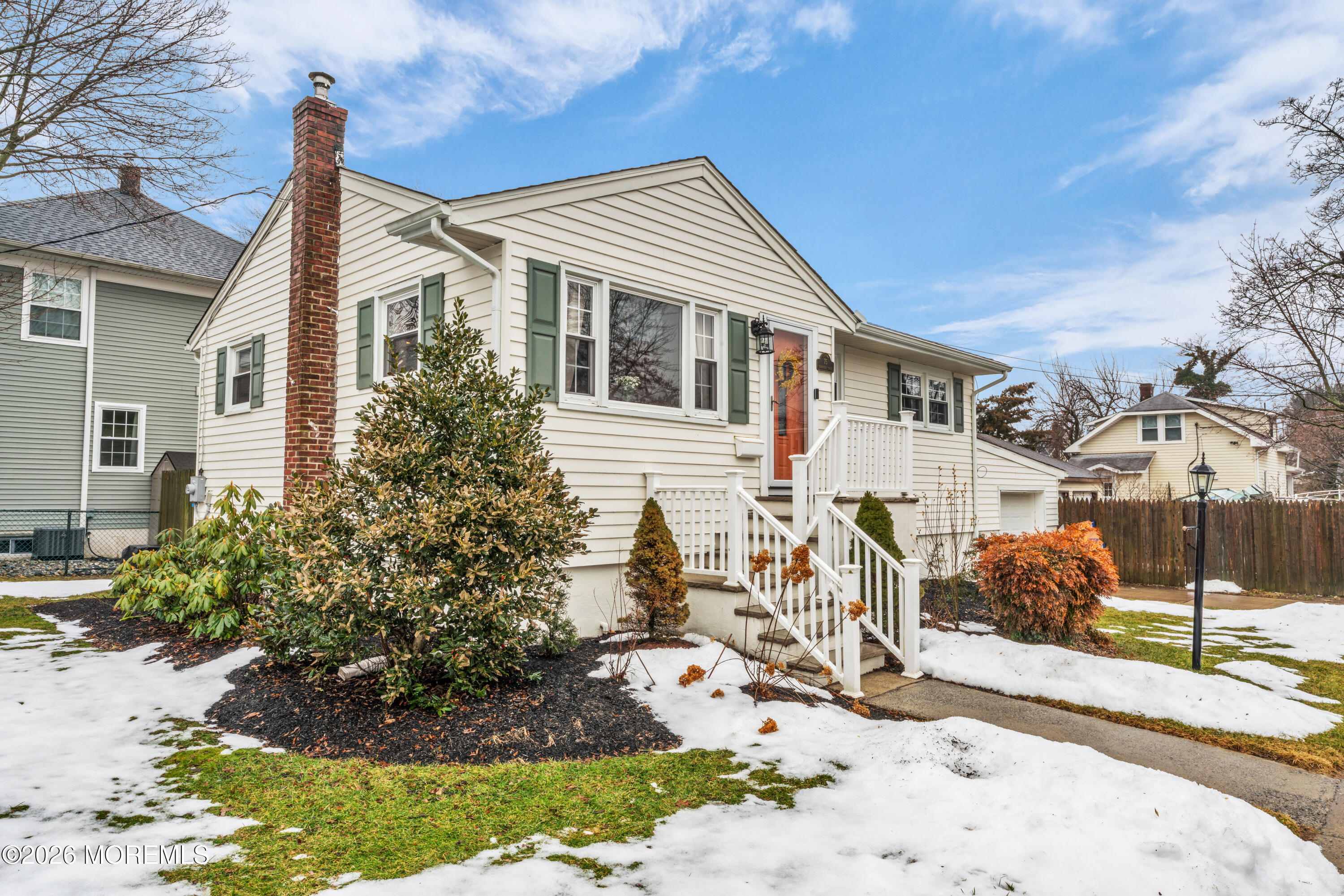75 Carpenter Street Red Bank, NJ 07701 - Photo 2 of 28 a front view of a house with a yard